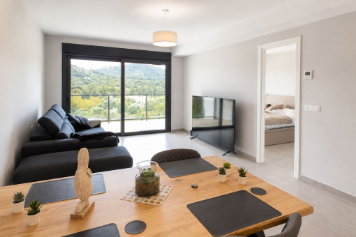Living and dining area with access to the balcony