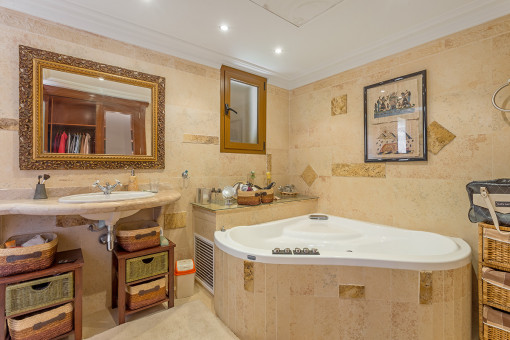 Master bathroom with large hydro-massage bathtub