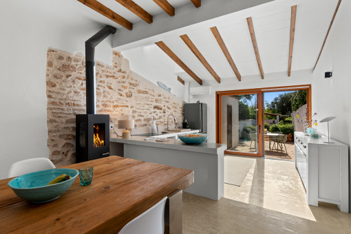 Lovingly Renovated Townhouse in Ses Salines with Mediterranean Garden and Rooftop Terrace Offering Panoramic Views